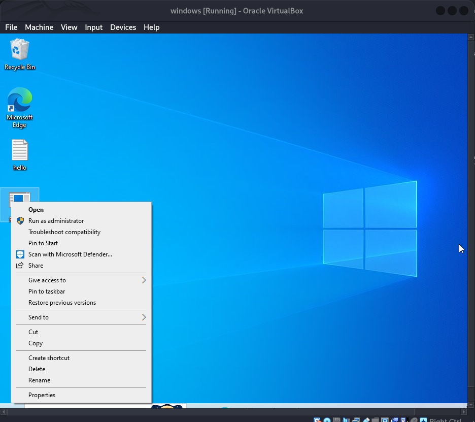 Windows desktop showing right-click context menu on payload executable before running it